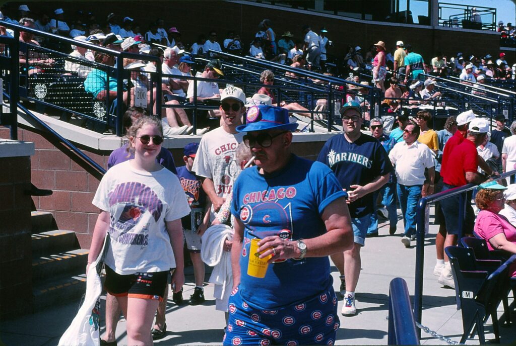 The vibe tends to be hard-core casual at Cactus League games such as this one in Peoria.