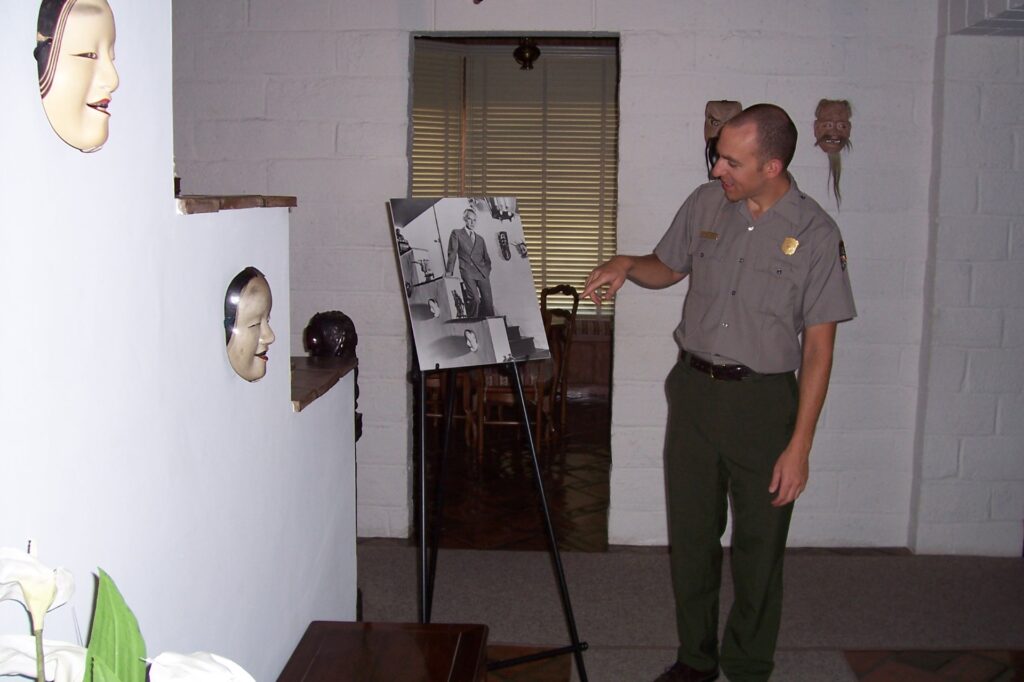 Tour guide Matthew Greuel points to a picture of Eugene O'Neill at the playwright's Tao House.