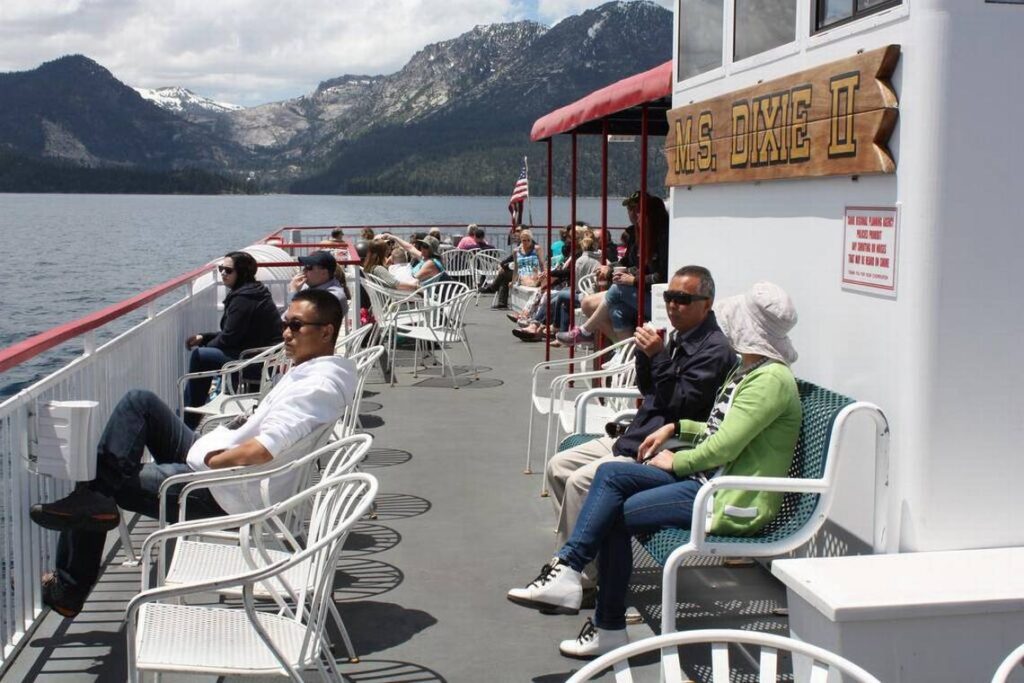 Passengers relax on the M.S. Dixie II, Lake Tahoe's largest cruising boat. The picturesque paddle-wheeler glides twice daily between Zephyr Cove, Nev., and Emerald Bay on the California side. 