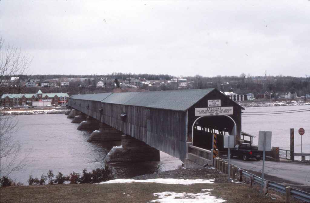 Hartland, New Brunswick. has what signs claim to be the world’s longest covered bridge, at 1,282 feet.