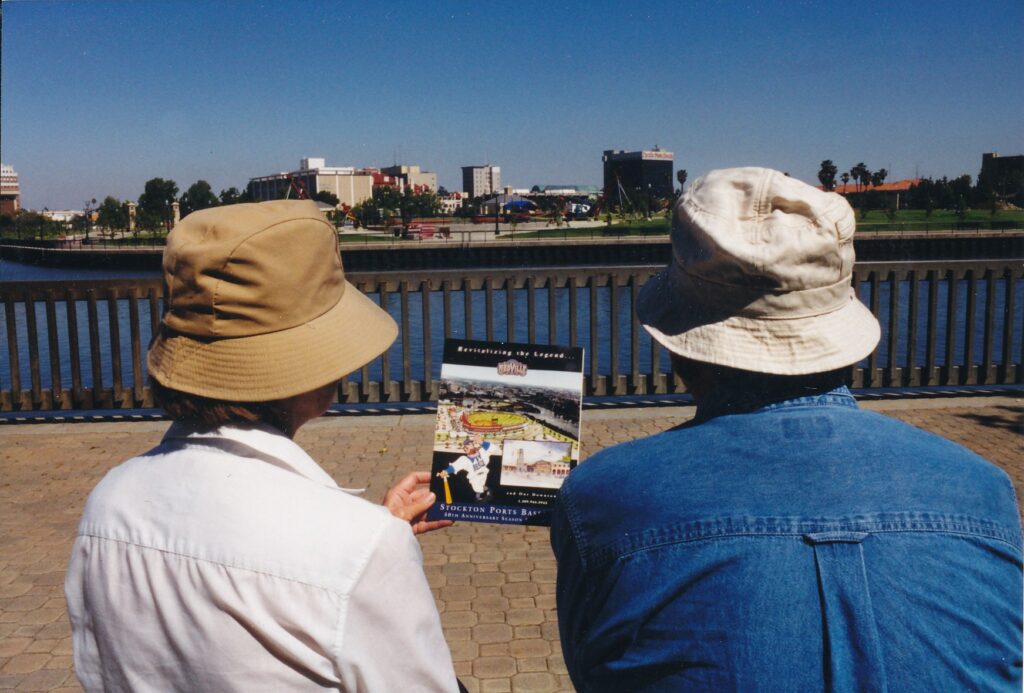 My parents, Hazel and Roger Parsell, sit at the proposed site for Stockton's new baseball stadium.